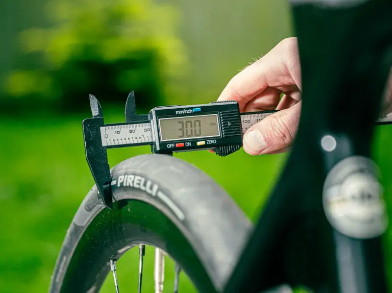 Determine the tire’s width in millimeters - Measuring a Bike Tire: How to do it?