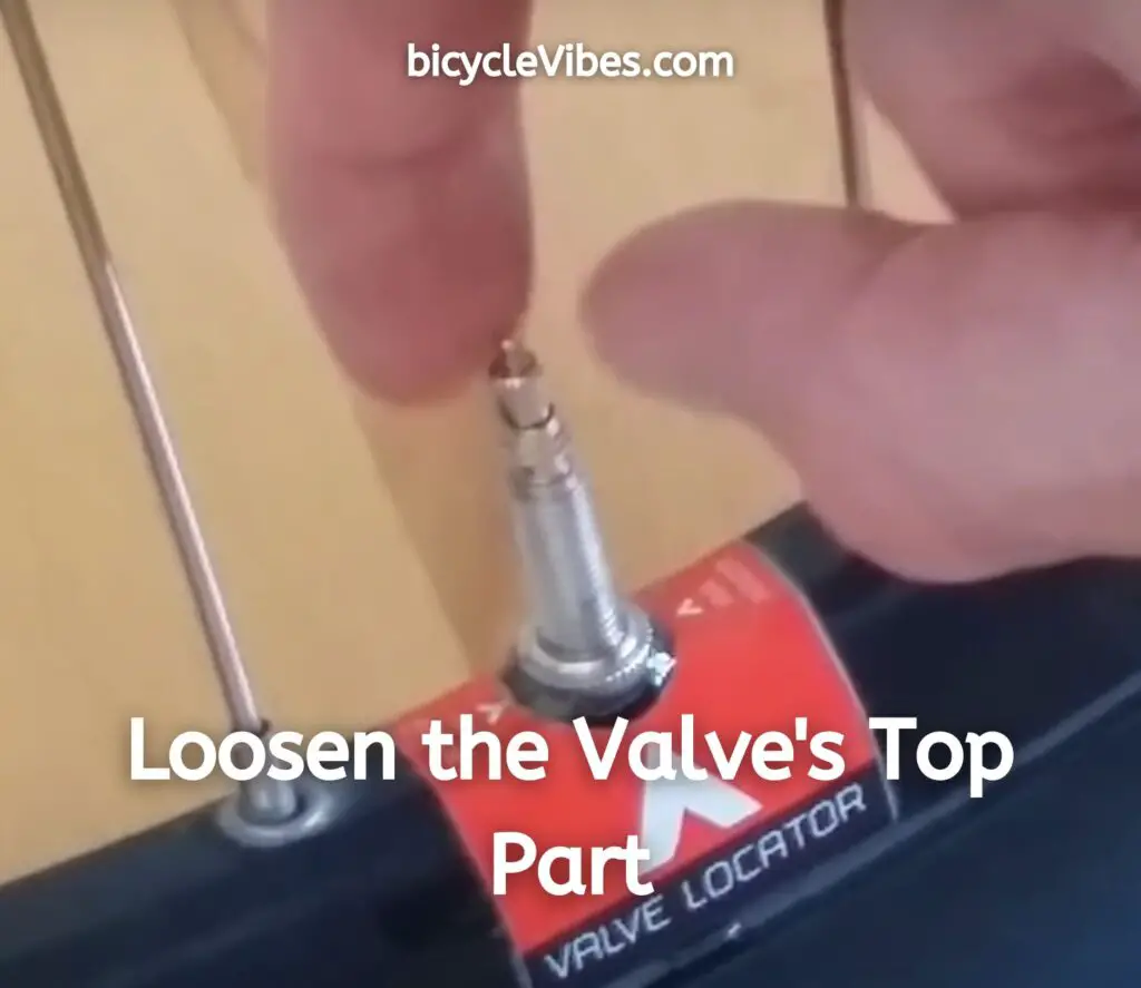 Loosen the Valve's Top Part - How to Use an Air Compressor with a Presta Valve?